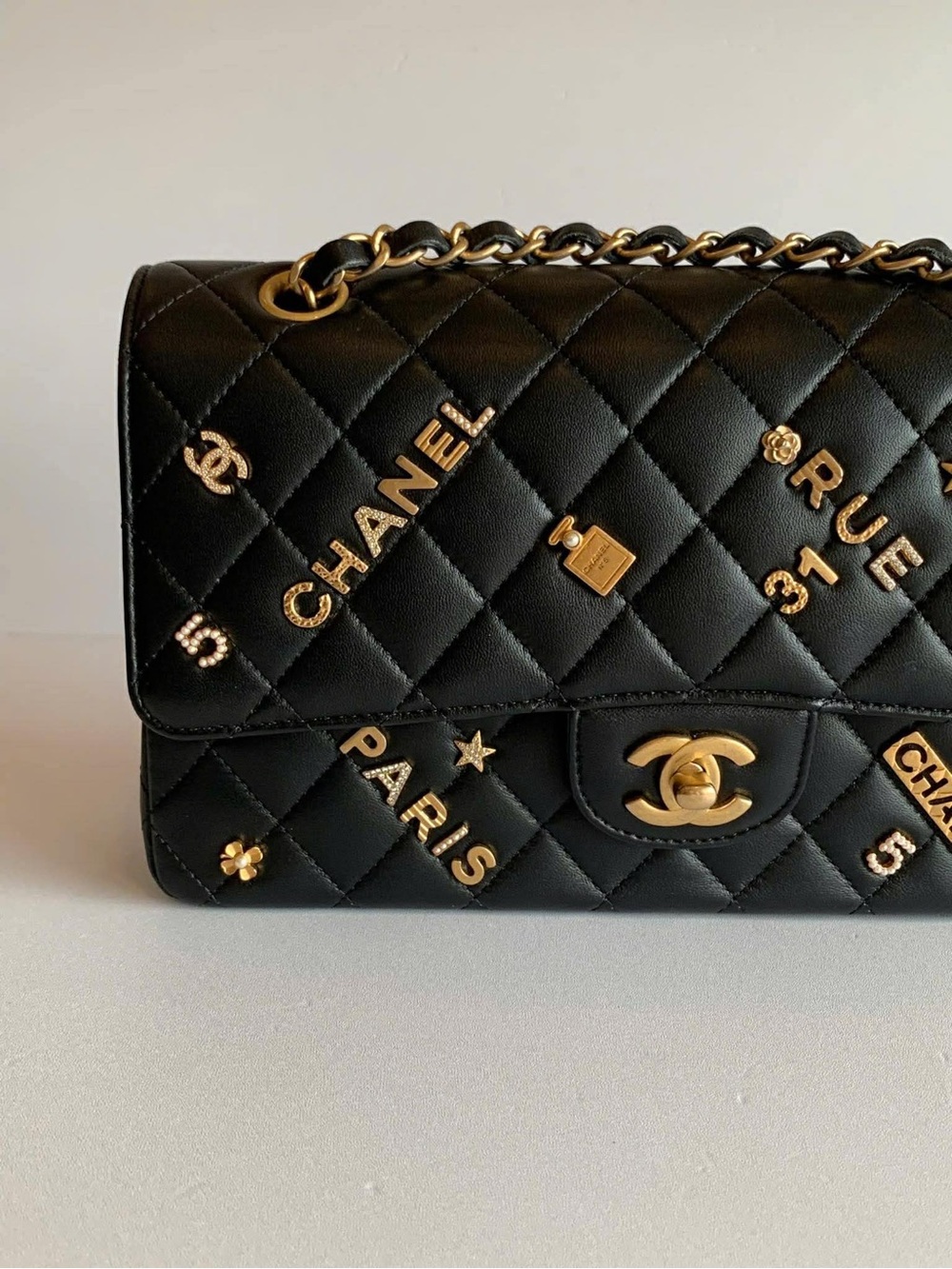CHANEL Black Quilted Leather  Gold Accents

Classic style! - Picture 2 of 12